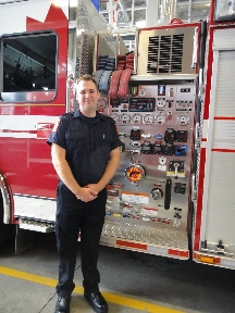 Sugar proudly poses, beside his new engine, for his first ever photo in uniform